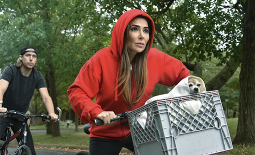 Scene from ET the movie recreated by Bianca Jade and her dog.